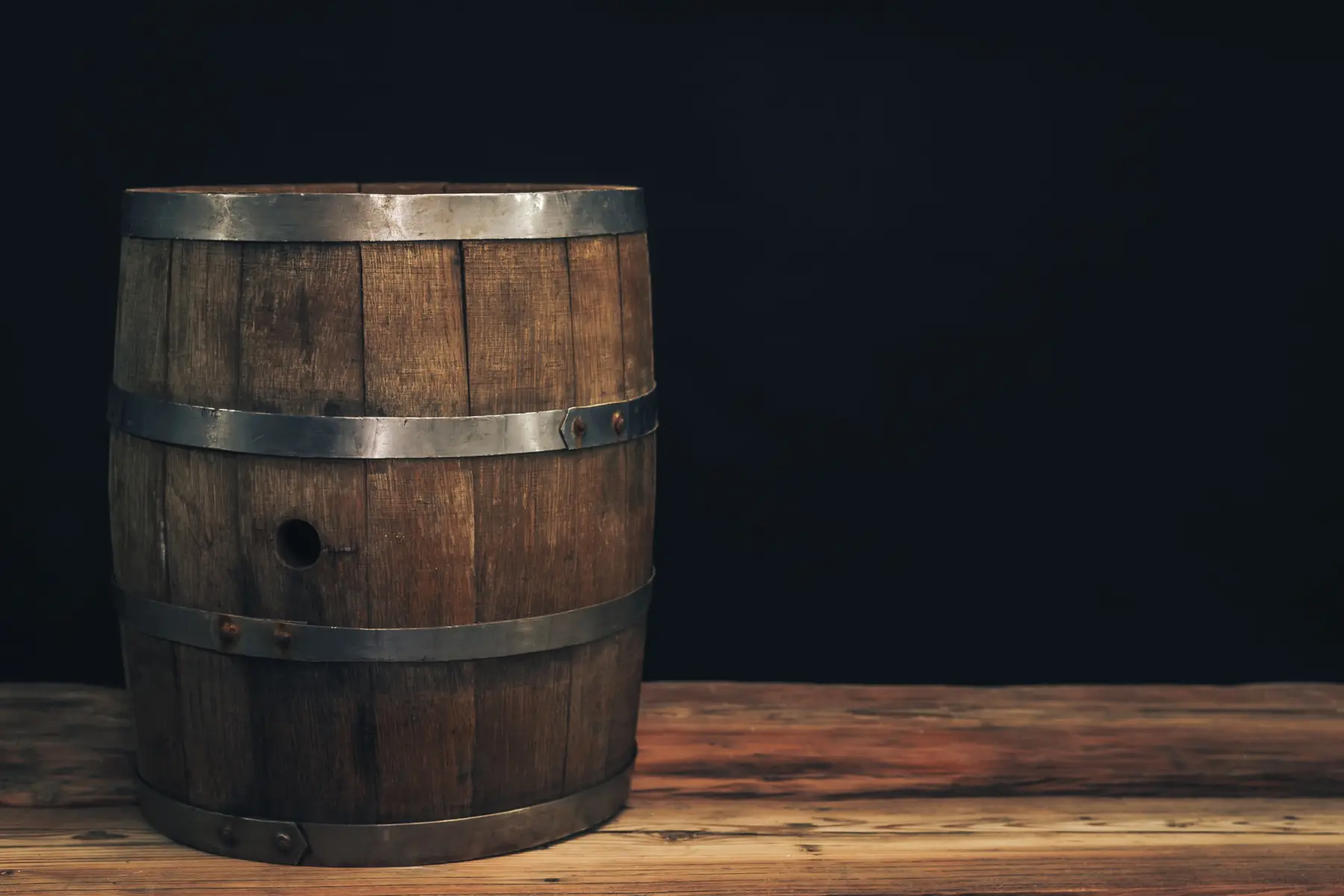 Whiskey barrel in a dark bar